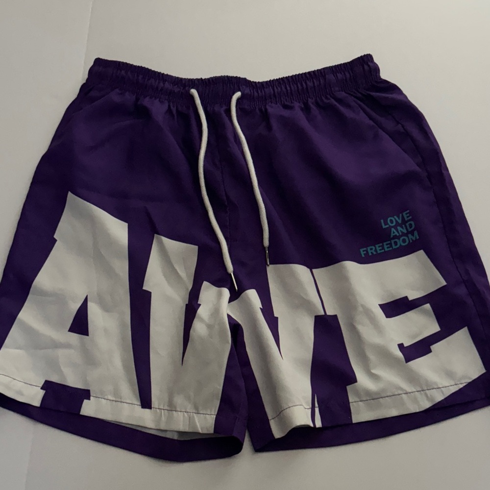 Purple Shorts with White Lettering